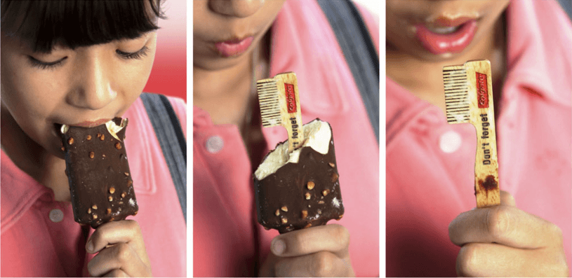 guerilla marketing examples: Colgate’s Wooden Sticks in Ice-Cream Bars