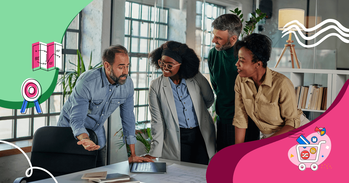 a group of people standing brainstorming around a desk